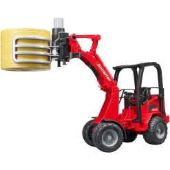 Hoflader mit Ballengreifzange